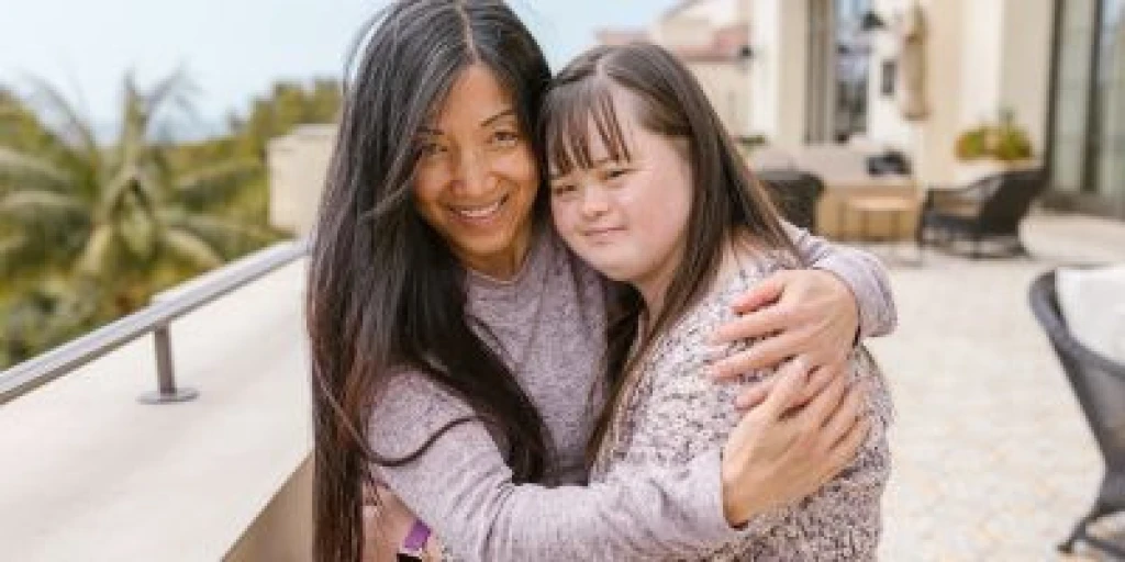 Two women hugging