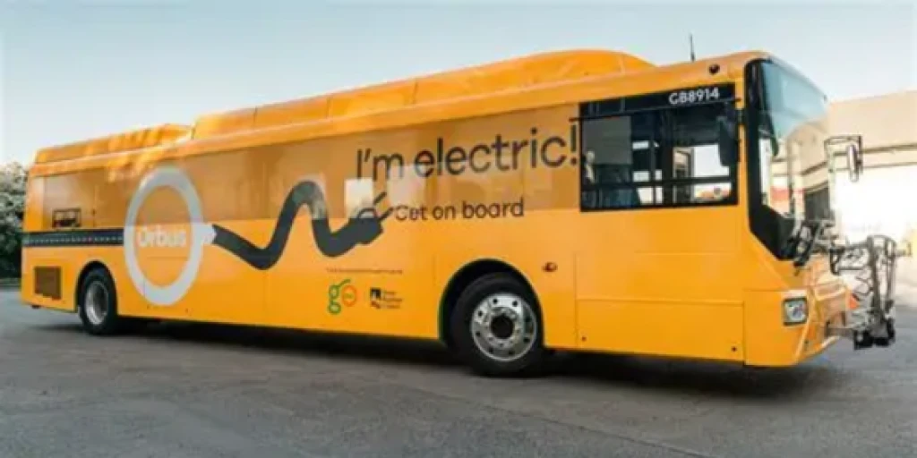 A yellow electric bus