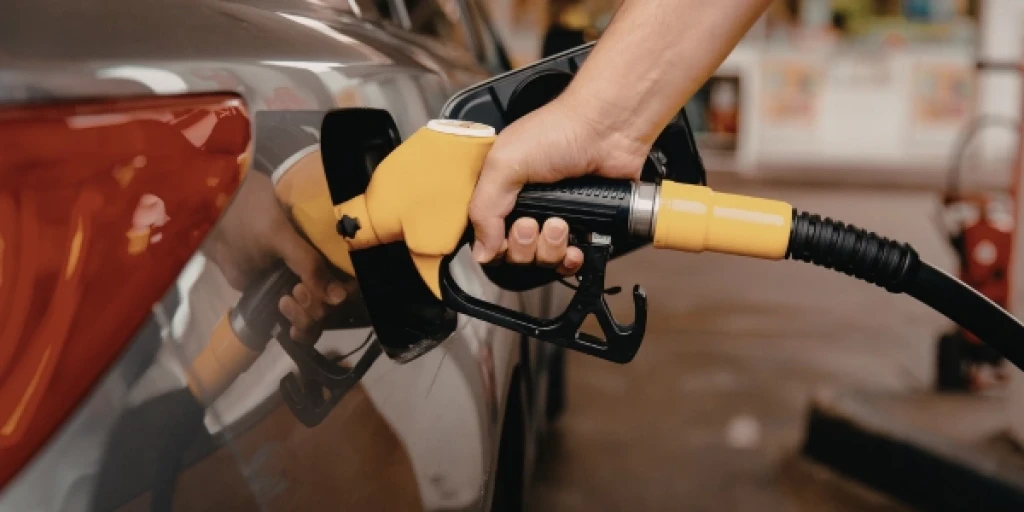 A petrol pump in a car