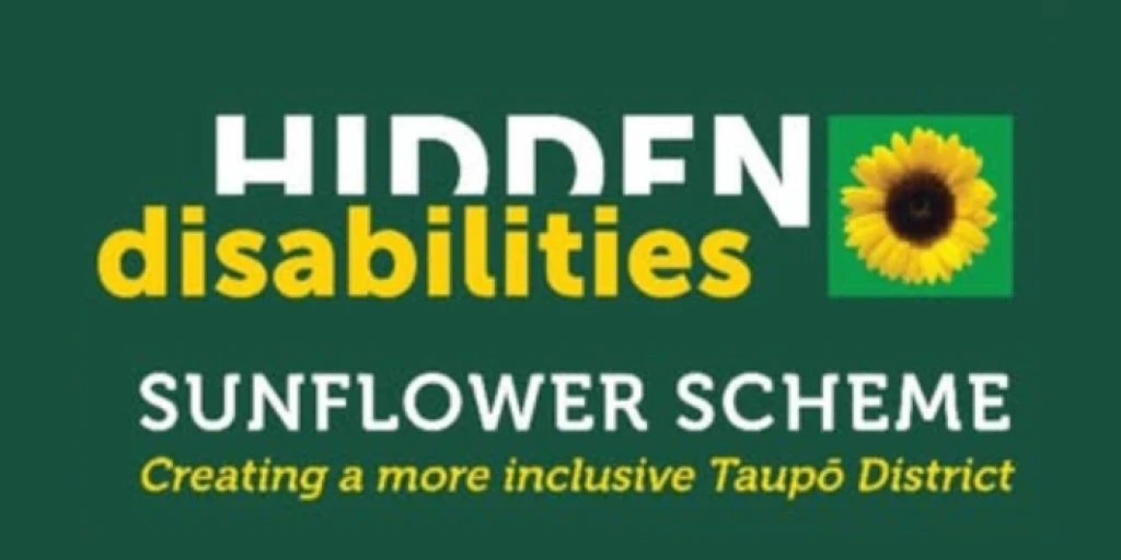 'Hidden Disabilities Sunflower Scheme. Creating a more inclusive Taupō District'  written on a green background with a sunflower to the right of the text