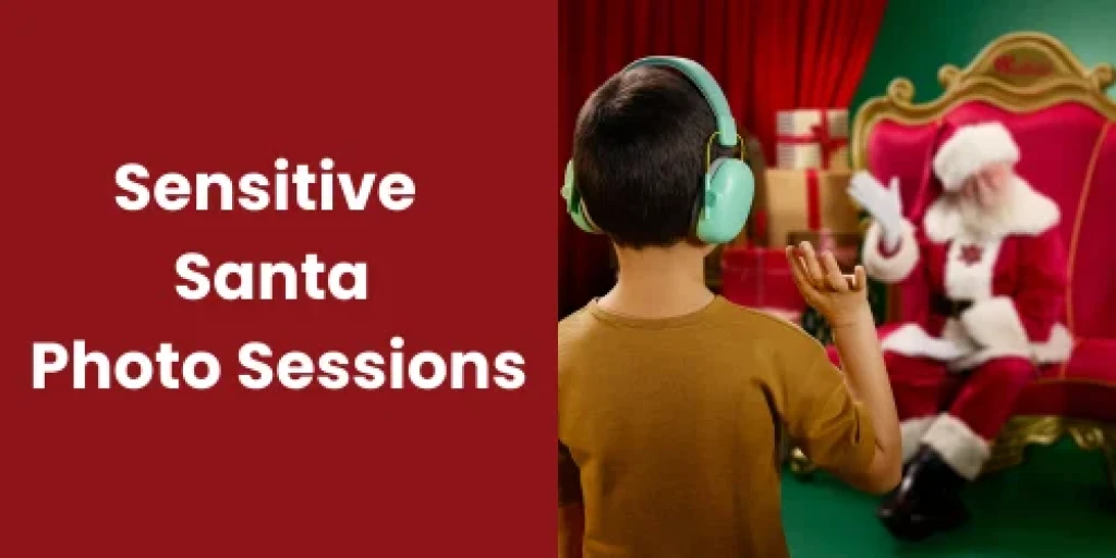 A boy wearing earmuffs waving at Santa